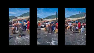 En Nuevo León aprovechan fuga de agua para bañarse en la calle; ve videos
