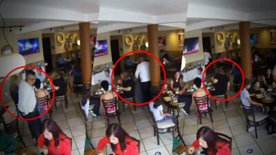 Ladrón roba bolsa en un restaurante, usó su saco para esconderla