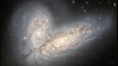 Choque De Galaxias Mariposa Cosmica